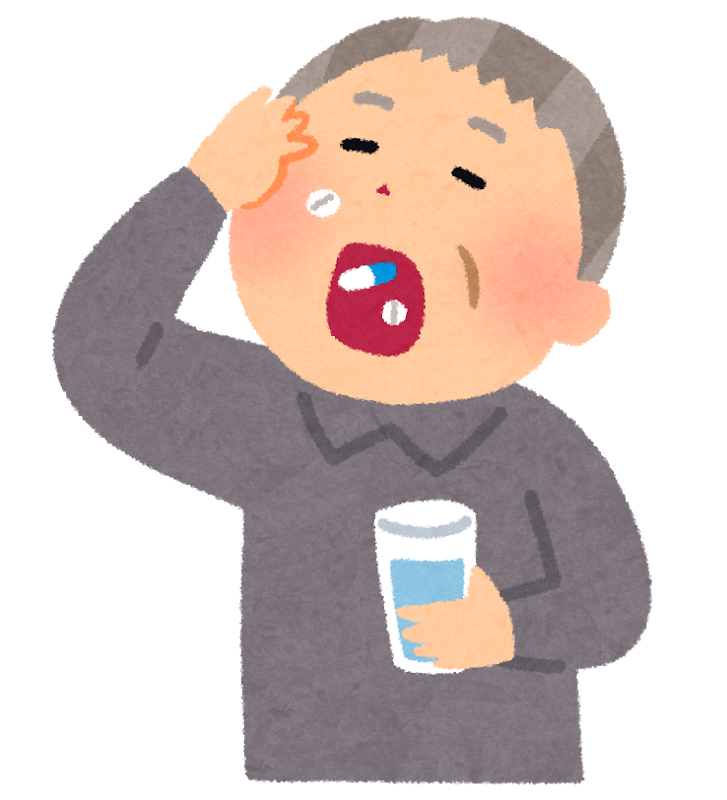 薬を飲む高齢者